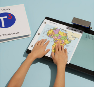 User exploring a tactile display of a map of Africa